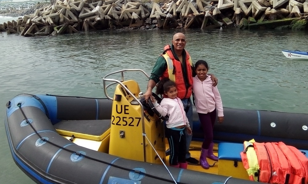 Ferrying service transporting goods and people by boat in Cape Town