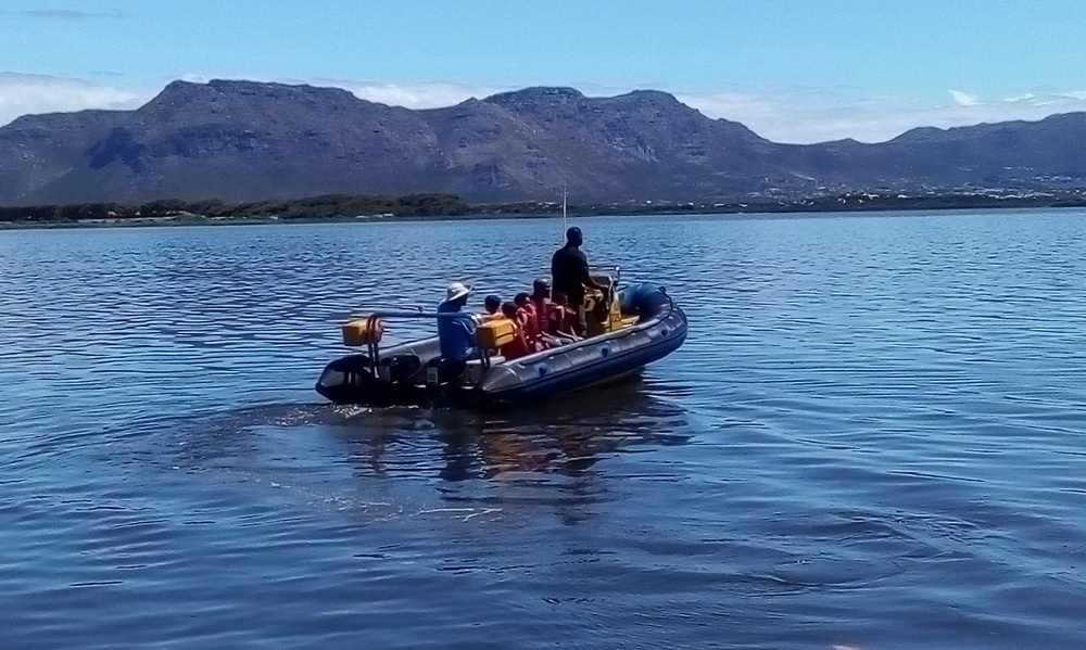 Family celebrating a special occasion on a private boat trip